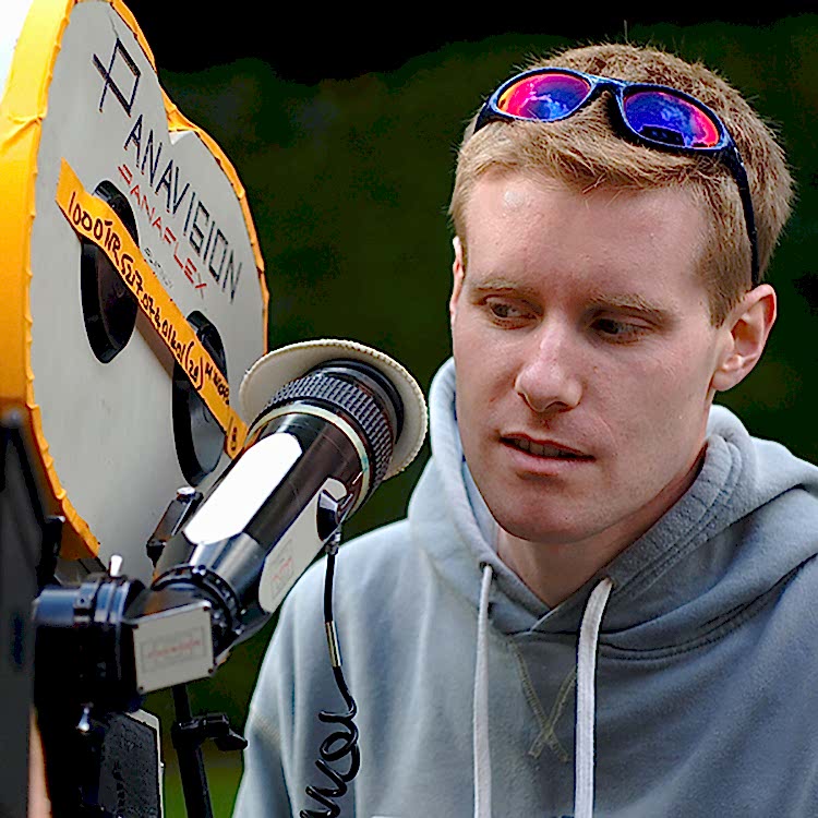 Writer/Director Mike Rymer has a look through the lens of the Panaflex Platinum 35mm camera to check a shot on the set of his 35mm short film 'SICK'. Copyright EgoProject Films 2007.